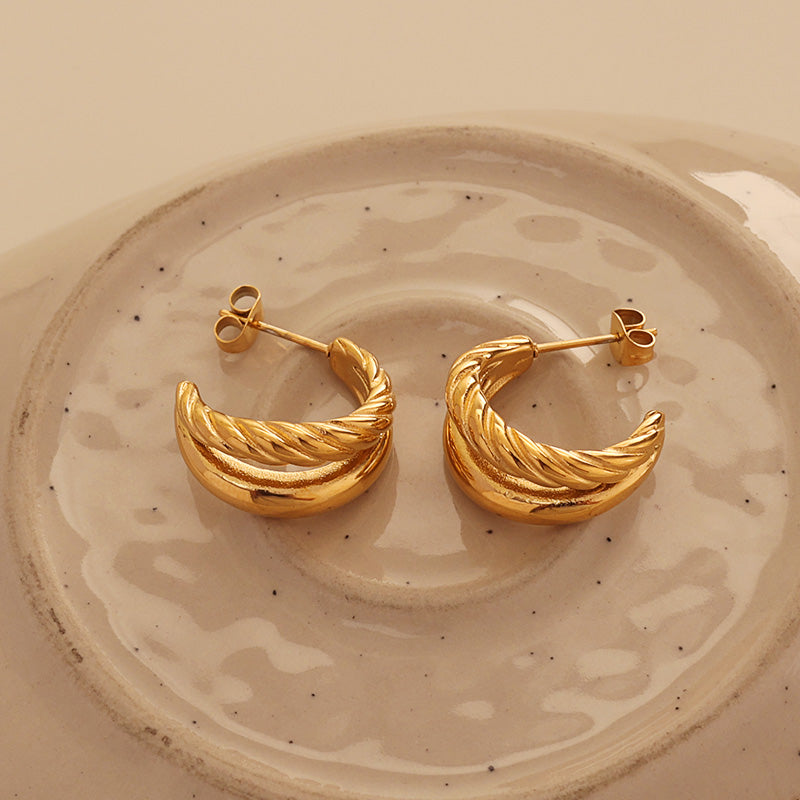 Twist Huggie Hoops – Gold