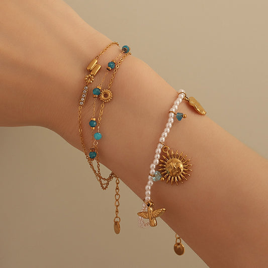 Aqua Bead Charm Bracelet – Gold