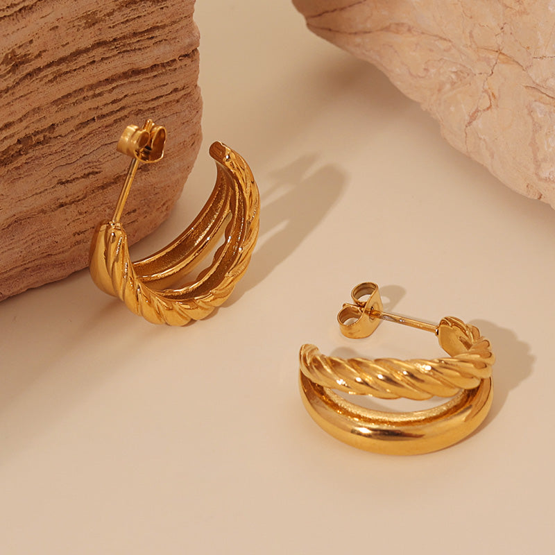 Twist Huggie Hoops – Gold