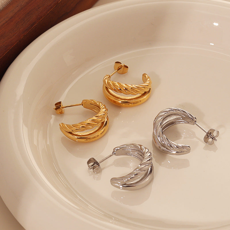 Twist Huggie Hoops – Gold